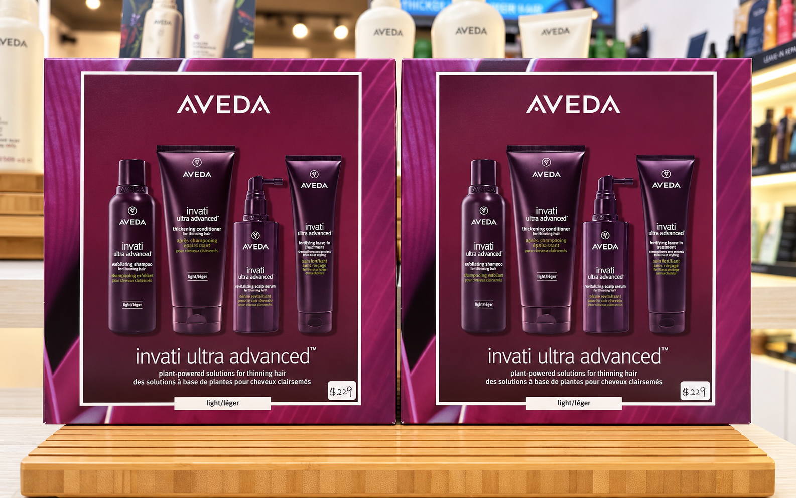Two AVEDA Invati Ultra Advanced Light gift sets displayed at ecoChic AVEDA Lifestyle Salon and SPA in Victoria BC