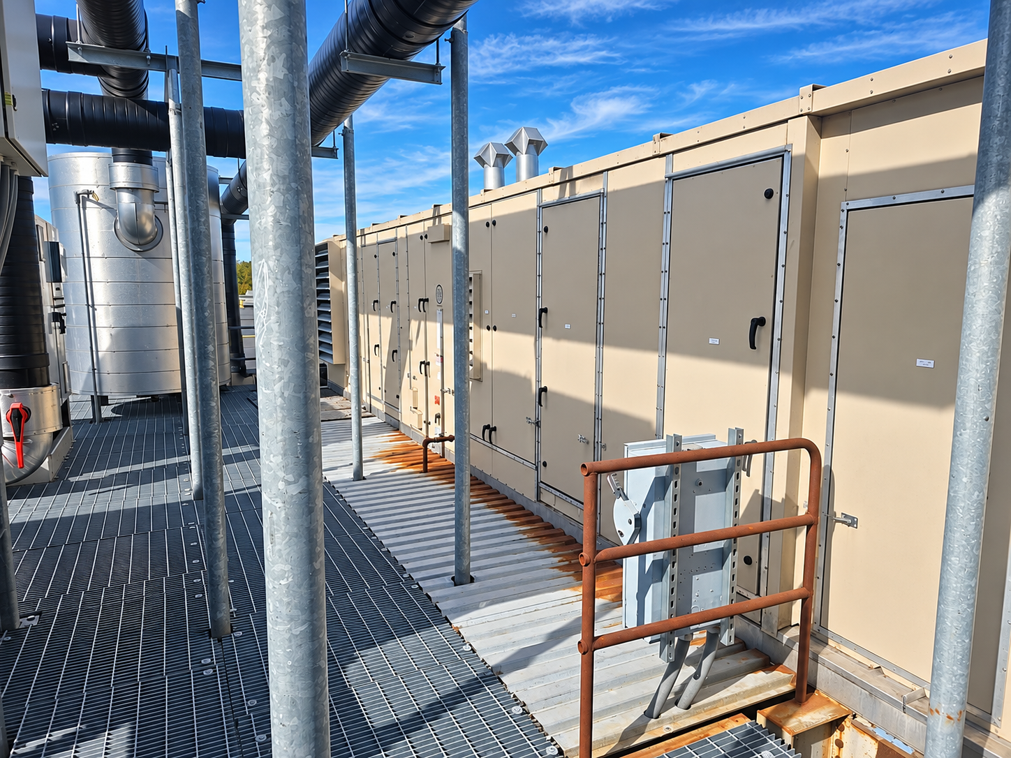 Rooftop HVAC equipment at a commercial facility, professionally cleaned and maintained